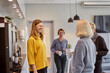 © Johnér - Women talking in office kitchen