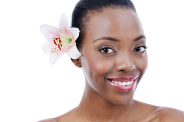 Wall Mural - Adding that feminine touch. Studio shot of a young african american model with a flower isolated on white.