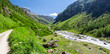 © liaiac - Trekking in the Valgrisenche Natural Park. Panorama along the path among flowers, mountains, peacks, meadows and pastures. Alpine Landscape of Italian Alps in summer. Aosta Valley. Alps Italy.