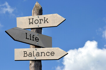 Sticker - Work, life, balance - wooden signpost with three arrows, sky with clouds