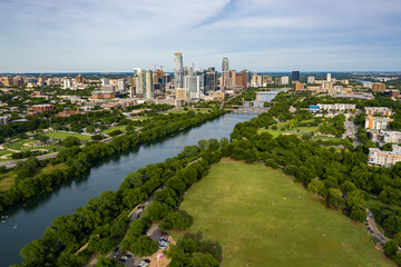 Wall Mural - Downtown Austin, Texas skyline cityscape with Colorado River and Lake Austin landscape and Zilker Park - 4K Drone