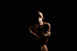 © eugenepartyzan - Woman silhouette in the dark. Beautiful Naked Body Girl