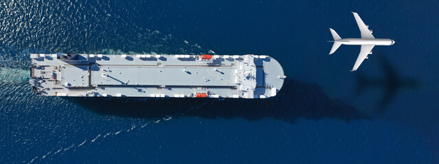 Aerial drone concept top down photo of huge car carrier ship RO-RO (Roll on Roll off) and plane flying indicating means of transport of cargo shipment