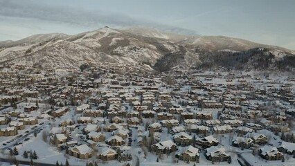 Wall Mural - Aerial view ski resort mountain town in Steamboat Springs, Colorado resort landscape- 4K Drone