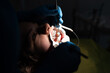 © Minet - Close up of girl with brackets receiving dental braces treatment in clinic
