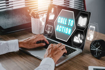 Call to action concept, Person working on laptop computer with call to action icon on virtual screen.