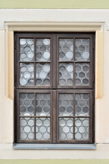 Wall Mural - view of old building with wooden window