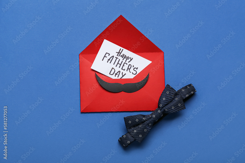 Envelope, bow tie and card with text HAPPY FATHER'S DAY on color background