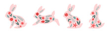 A Set Of Cute Bunnies In Folk Style. Easter Spring Bunnies With Floral Pattern On White Background