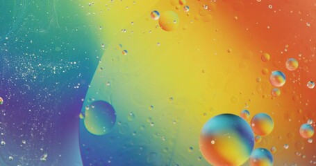 Canvas Print - Animation of bubbles moving on blue and yellow liquid with copy space