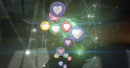 Sticker - Animation of heart icons and network of connections over mid section of a man using smartphone