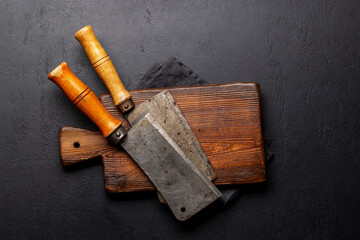 Wall Mural - Meat butcher knifes on cutting board