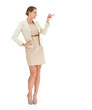 © Tylan/peopleimages.com - Showing you the solution. A beautiful businesswoman pointing towards copyspace against a white background.