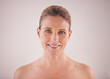 © Jeff B/peopleimages.com - Feel beautiful at every age. Cropped studio portrait of a beautiful mature woman with bare shoulders.