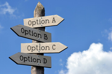 Sticker - Option A, B, C or D - wooden signpost with four arrows, sky with clouds