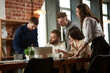 © master1305 - Young ambitious business people, employees at the meeting in modern office. Discussion of projects, checking documents. Concept of business, teamwork, career development, brainstorming