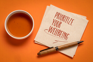 Wall Mural - prioritize your wellbeing, inspirational note on a napkin, self care concept