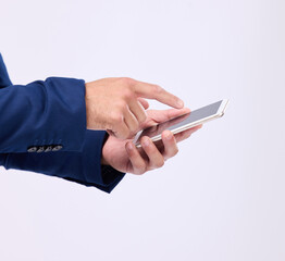 Aufkleber - Man, phone in hands and typing in studio for communication with network connection on social media. Hand of male with smartphone for internet search, mobile app and online chat on a white background