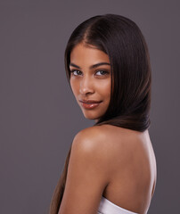 perfect poise and real beauty. portrait of a beautiful young woman posing in the studio.