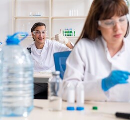 two chemists working in the lab