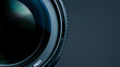 © Guillermo - Camera lens on a black background. Close-up of a camera lens.