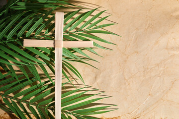 palm sunday background. cross and palm on vintage background.