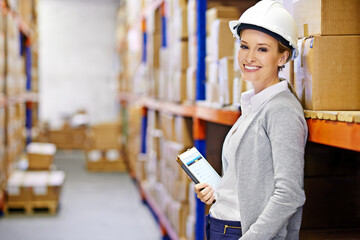 Poster - Ensuring delivery with a smile. a woman at work in a storage warehouse.