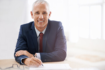Aufkleber - Ill sign this and then were in business. Portrait of a mature businessman sitting at his desk in an office.