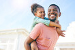 © C.D./peopleimages.com - Mockup, piggy back and black father with girl, outside new house and playful family with love and happiness. African American dad carry daughter, happy child and kid with smile, fun and cheerful