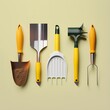 set of yellow orange gardening tools yellow background