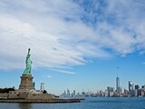 Fototapeta Nowy Jork - The Statue of Liberty sits on Liberty Island in the New York Harbor. It was once a beacon of hope for immigrants arriving by steamship into the United States