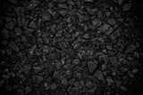 Fototapeta  - Natural black coals for background design. Industrial coals. Volcanic rock energy on earth.