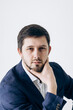 © Alexey - Portrait of a man in a business suit and white shirt