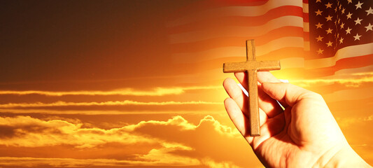 Wall Mural - Good Friday concept. Cross in arm on sky background. USA flag. 3d illustration.