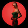 © oleg_ermak - Fashion art photo of elegant model in seductive green lingerie with light neon colored club spotlights