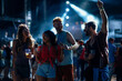 © bernardbodo - Group of happy friends dancing at festival outdoors