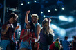 © bernardbodo - Young cheerful friends dancing at concert