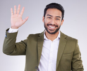 Wall Mural - Portrait, greeting and Asian man with success, wave and guy against grey studio background. Face, Japanese male and entrepreneur with smile, opportunity and hello with employee, happiness and welcome