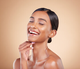 Sticker - Face, eyes closed or makeup on happy woman in studio isolated on beige background for skincare. Facial smile, natural beauty or funny Indian girl laughing with glow or luxury self care cosmetics