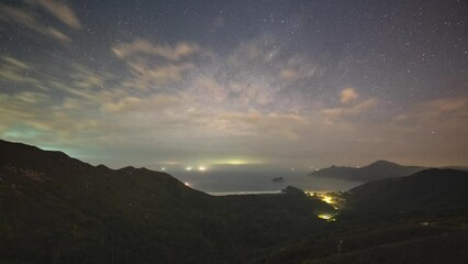 Poster - night sky timelapse with dramatic clouds over tai long au sai kung hong kong city