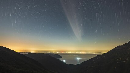 Poster - clouds race over sky, city lights flicker in night lapse tai long au sai kung hong kong