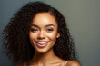 © Margo_Alexa - Beautiful portrait of an ethnic model with healthy skin on a light background. Lifestyle and cosmetics. Smiling beautiful girl. curly hair.generative AI
