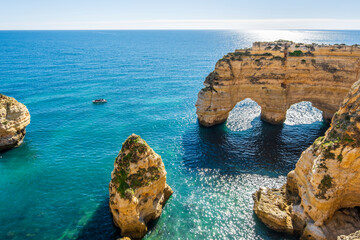 Sticker - Beautiful cliffs and rock formations at Marinha Beach in Algarve, Portugal