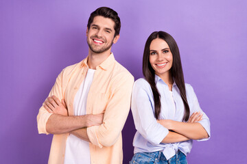 Poster - Photo of confident positive married couple wear shirts arms crossed smiling isolated violet color background