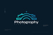 © WzKz - Camera Logo with Minimalist Line Concept in Blue Gradient Style. Suitable for Photography Studio, Cinema or Movie Company Logo