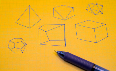 Photo of geometric shapes drawn in a notebook