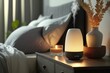 Aroma oil diffuser on table against in minimalist bedroom interior background. Generative AI