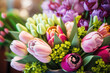 A bouquet of beautiful spring flowers is for sale in the florist shop for the holiday. AI generative