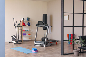 Poster - Interior of gym with modern treadmill and sport equipment