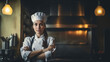 © ReisMedia - Portrait of a female cook in a restaurant kitchen. generative AI